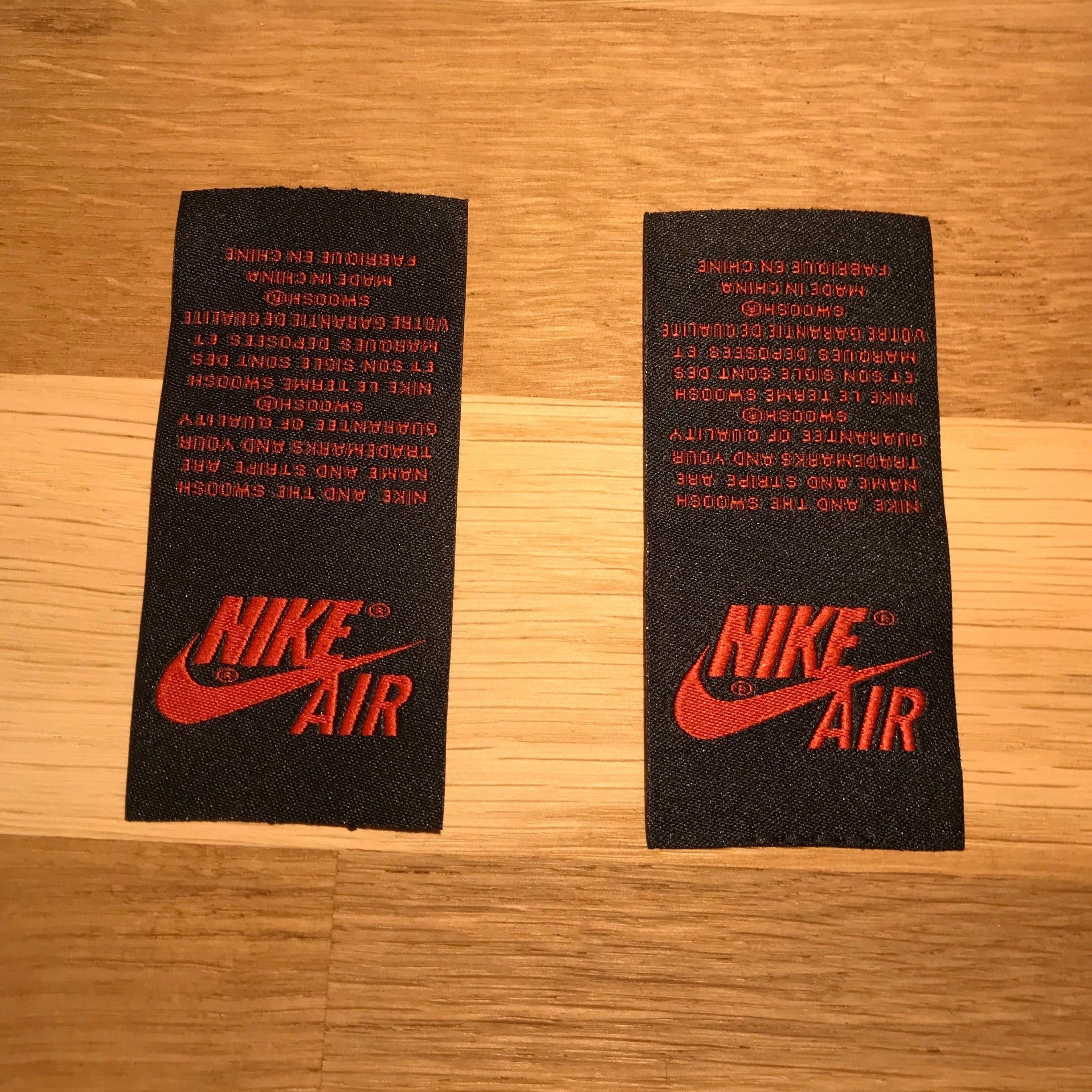 nike black red tag